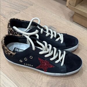 Brand new authentic Golden Goose Black Low-Top Sneakers with Red Glitter Star